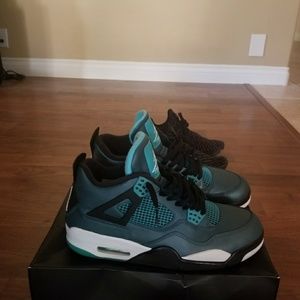 Teal jordan 4s